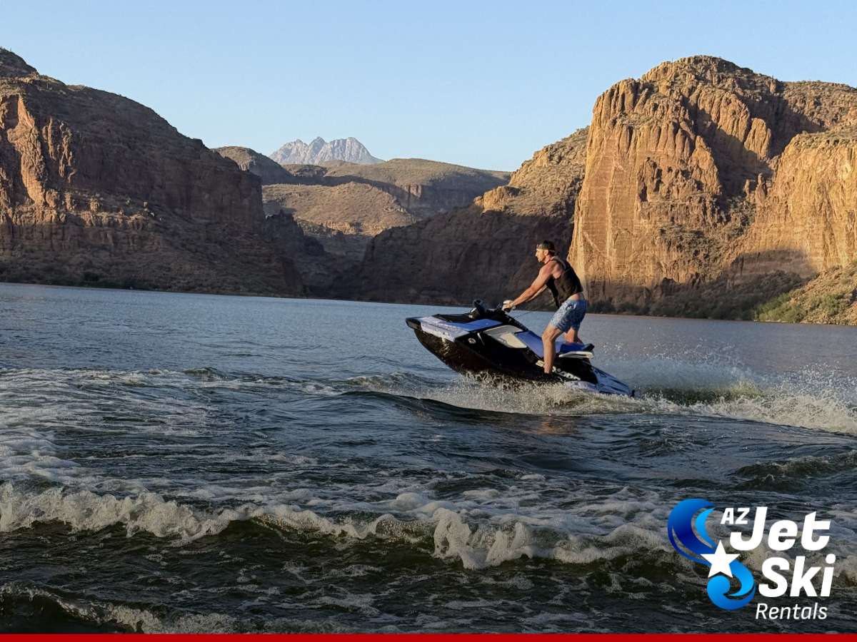 Riding a Jet Ski on Arizona lake following safety and legal age rules